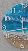 Load and play video in Gallery viewer, Handmade 12" Turquoise Ocean Resin Wall Clock – Full White Number Wave Art
