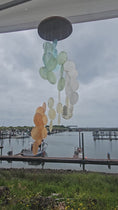 Load and play video in Gallery viewer, 15" Spiral Turquoise and Blues Capiz  Wind Chimes
