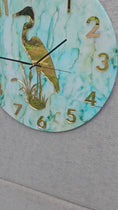 Charger et lire la vidéo dans la visionneuse de la galerie, Handmade 18" Coastal Great Blue Heron Wall Clock – Pastel Green & Blue Alcohol Ink Art with Gold Mirror Numbers & Silent Sweep
