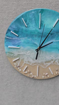 Load and play video in Gallery viewer, Handmade 12" Soft Turquoise Ocean Resin Wall Clock – Pastel Wave Art
