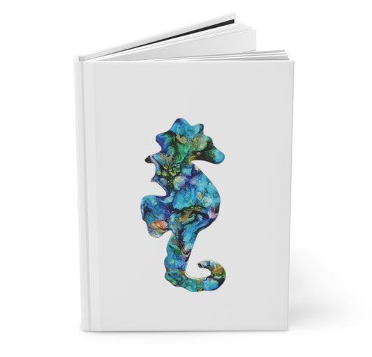 Beautiful Coastal Seahorse Print Hardcover Journal featuring a vibrant seahorse design on the cover, perfect for writing and note-taking with lined pages.