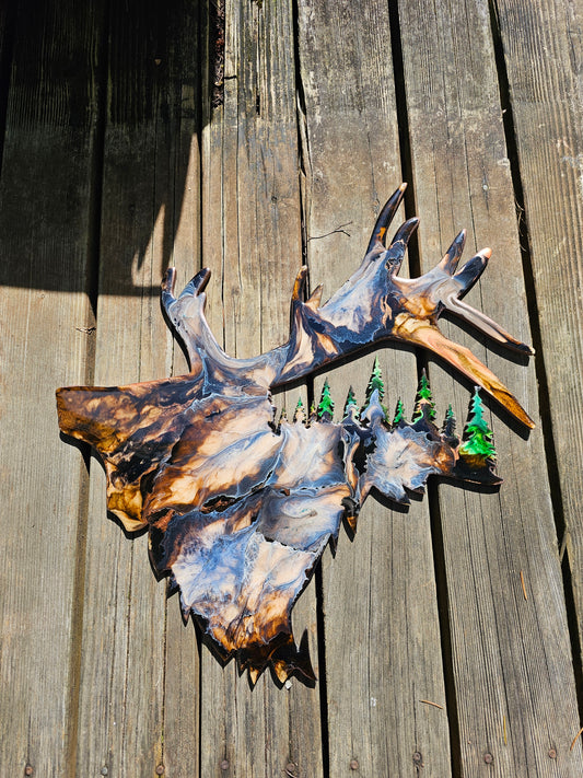Handmade resin on wood elegant elk wall decoration with tree cutouts, featuring multi-color greens and browns, perfect for rustic home decor.