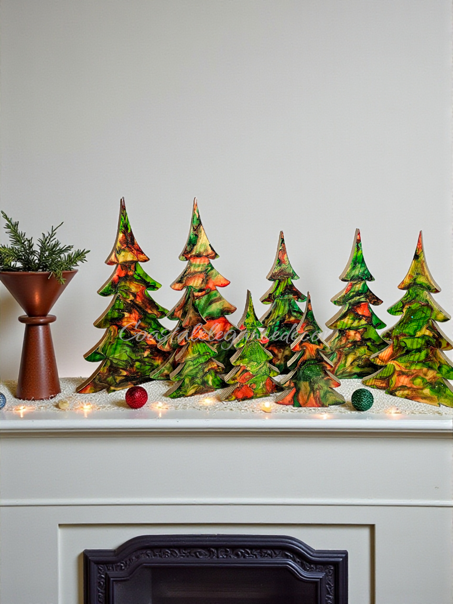 Handmade Green and Red Resin Christmas Trees with Branches Holiday Mantelpiece in XL size, beautifully adorned with metallic accents and glitter, perfect for festive decor.