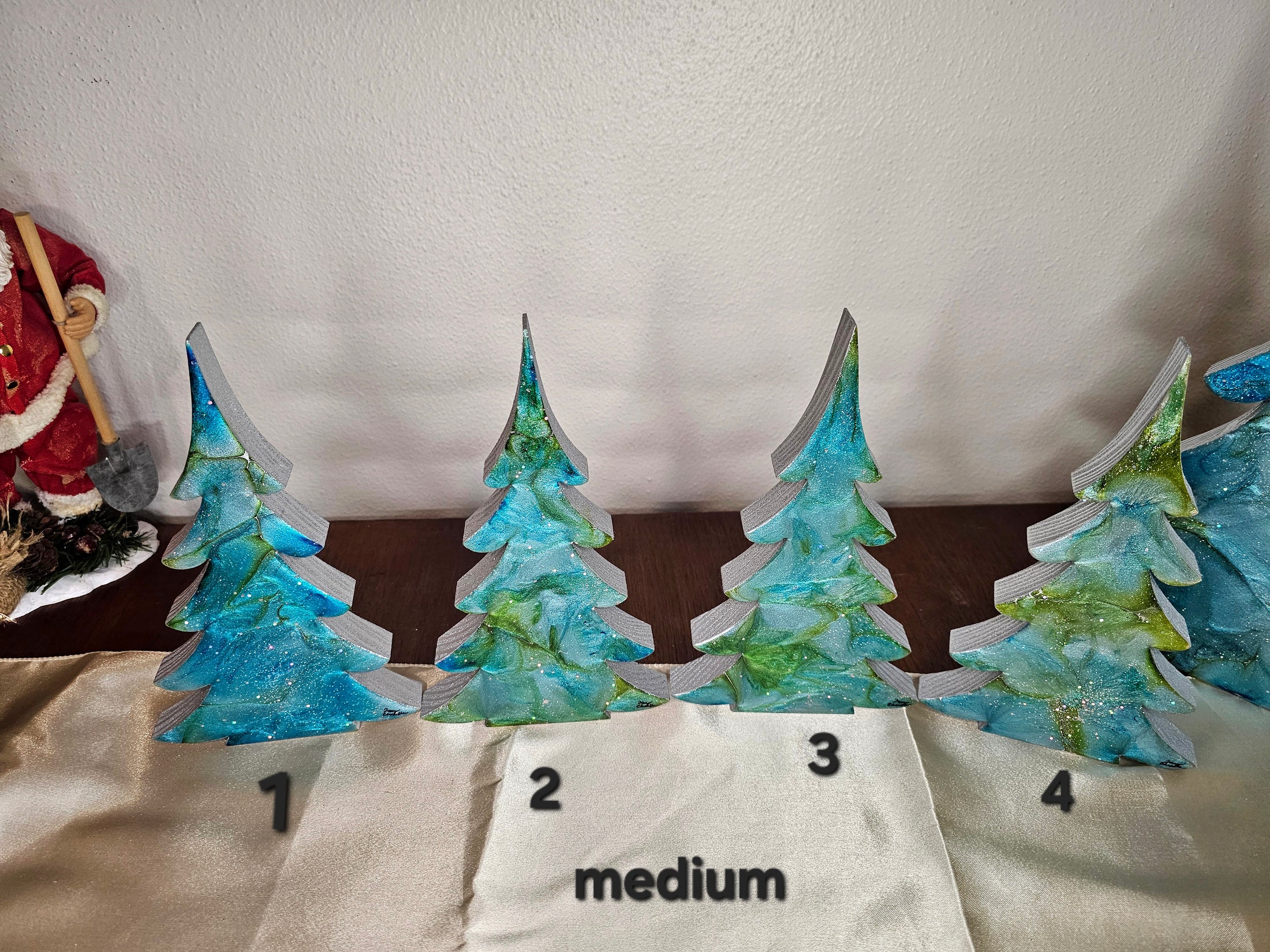 Handmade Blue Green Silver Resin Christmas Trees holiday mantelpiece decoration, showcasing stunning patterns and swirls in unique sizes: XL 15", LG 12", and Medium 8".