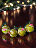 Charger l'image dans la visionneuse de la galerie, Green swirl luxury ink glass Christmas Ball handmade on dark wood table
