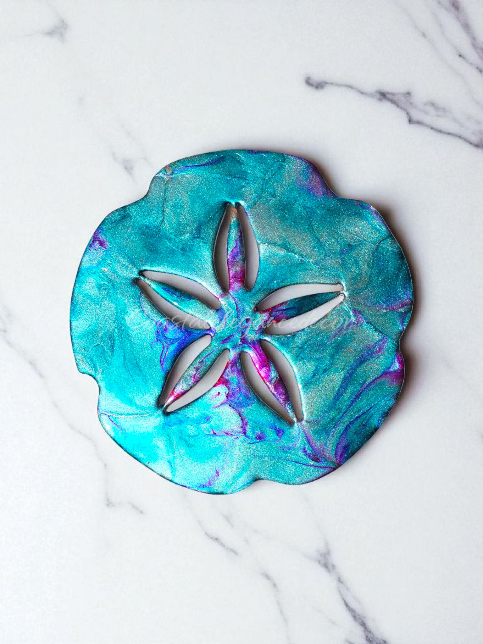 Colorful Beach Sand Dollar Wall Decoration Handmade by Coastal Elegance Decor, showcasing vibrant turquoise and violet swirls, perfect for coastal-themed decor.