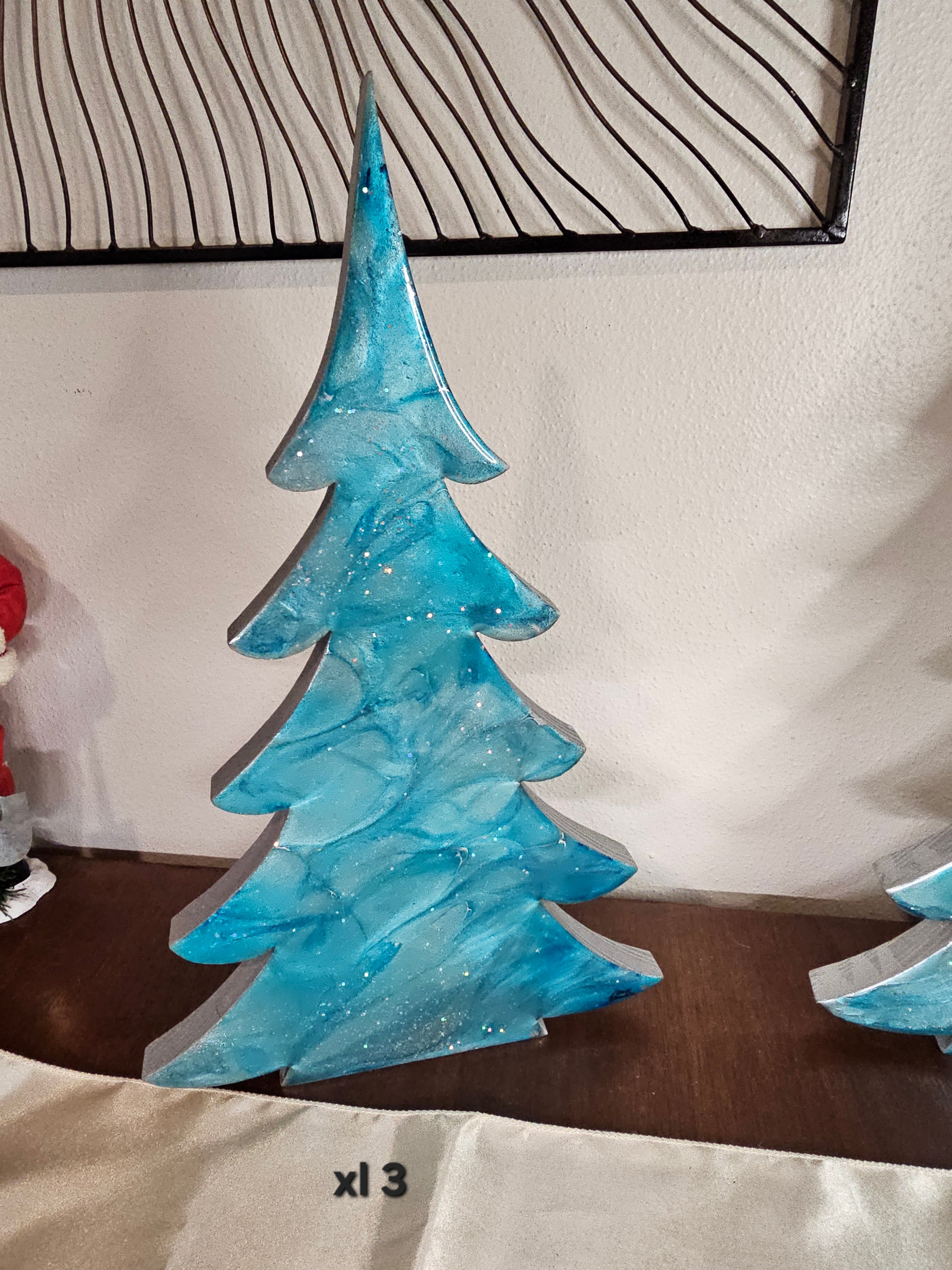 Charming Shimmery Silver Blue Evergreen Wood Christmas Trees in 15", 12", and 8" sizes, ideal for festive shelf decorations.