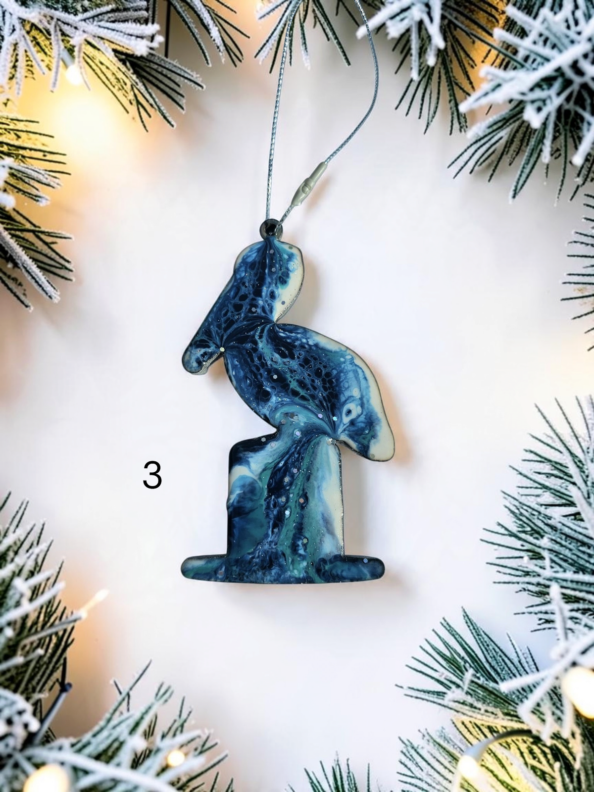 Blue and white sparkly handmade pelican resin and wood Christmas ornament 