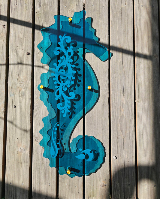 Custom engraved Teal Seahorse outdoor wall art by Coastal Elegance Decor, 1/4 inch transparent acrylic in sea-glass teal for coastal patio decor.