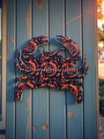 Load image into Gallery viewer, Outdoor acrylic wall crab in sunset current pattern hanging on blue wood wall
