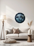 Load image into Gallery viewer, Close-up of the hand-airbrushed metallic gradient on a silent wall clock. The silver-to-blue transition mimics moonlight on water behind a detailed killer whale and evergreen tree silhouette.
