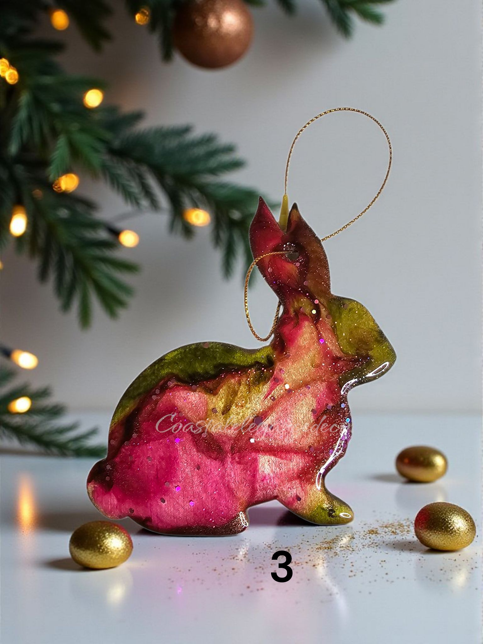 Colorful Rabbit Handmade Christmas Ornaments by Coastal Elegance Decor, featuring sparkly resin, wood design, and metallic accents.