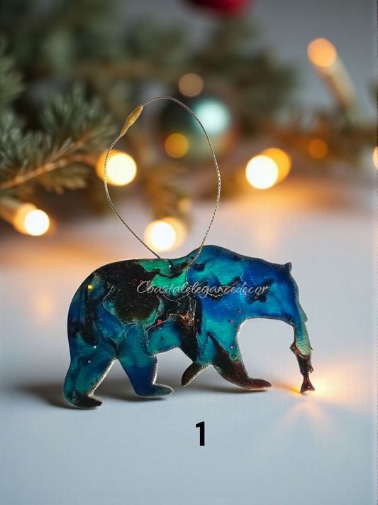 Handmade Grizzly Bear Christmas Ornament with Salmon hanging on a tree, adding a rustic wildlife cabin decor touch.
