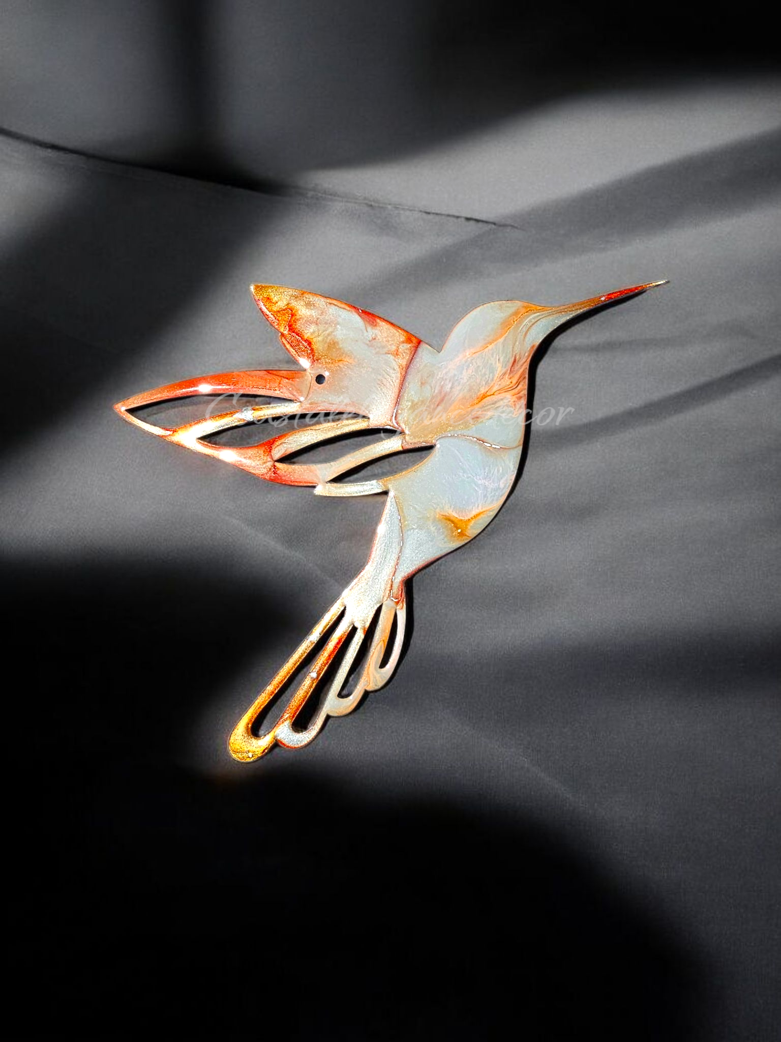 An artistic arrangement of hummingbirds, highlighting the charm of handmade resin on wood, perfect for wall display.