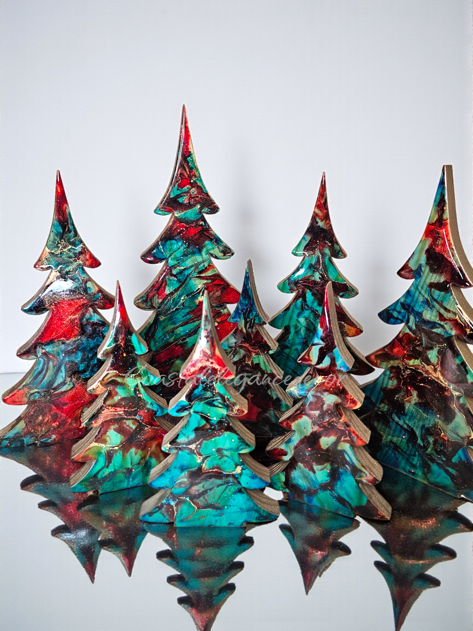 Handmade Turquoise Christmas Trees Shelf Sitter with Red Resin and Gold Accents in a warm holiday setting.