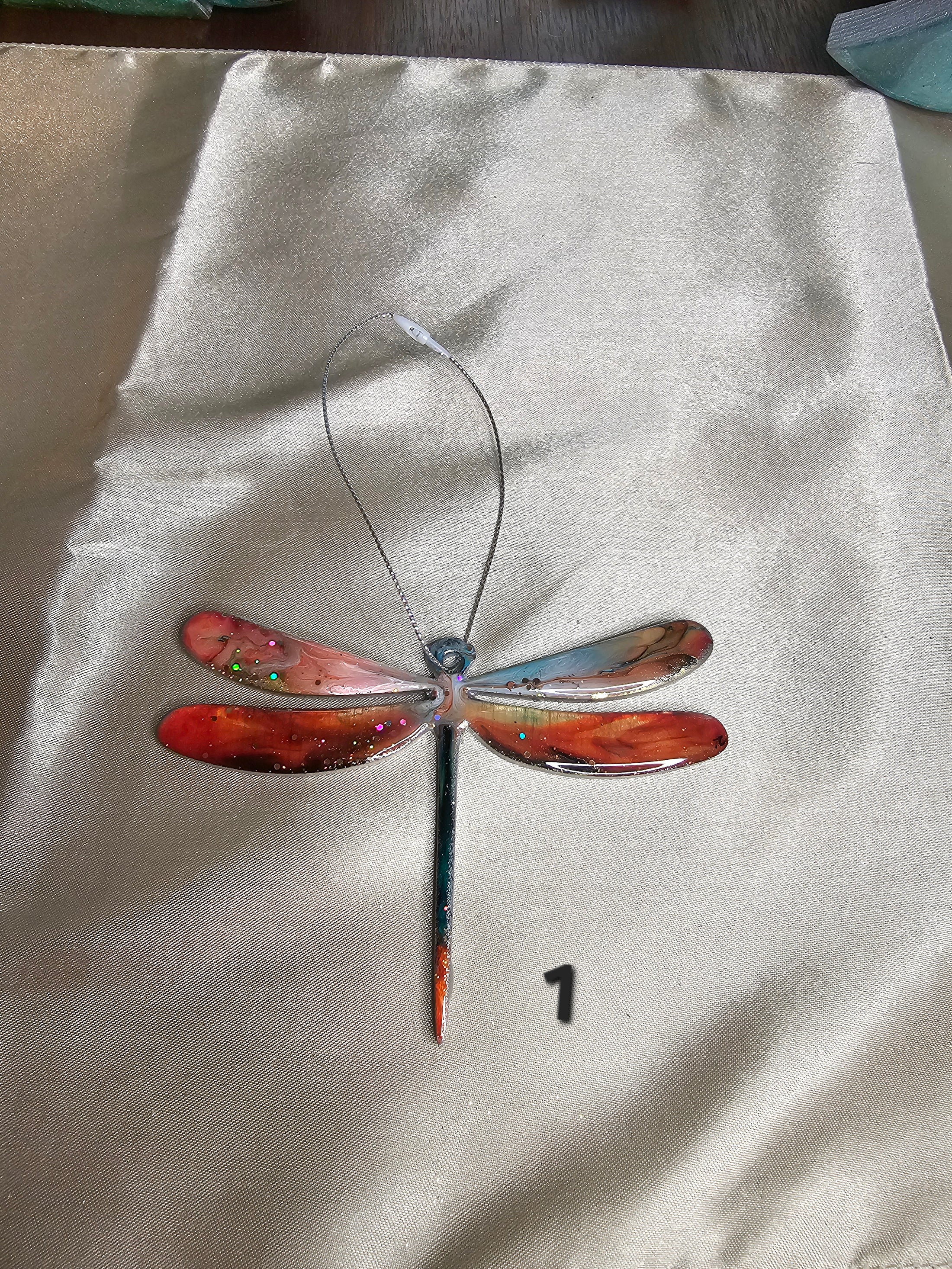 Multiple Handmade Nature Dragonfly Christmas Tree Keepsake Ornaments in assorted colors, perfect for holiday decoration.