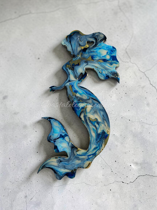 Deep blue with electric blue and cream accents handmade resin mermaid decoration.