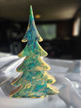 Charger l'image dans la visionneuse de la galerie, Artistic view of Handcrafted Blue-Green Tabletop Sparkly Christmas Trees 8 Inches portraying the glittery finish and signature by the artist.
