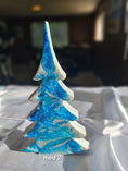 Load image into Gallery viewer, Two sizes of Handmade Blue and Silver Resin Christmas Trees Holiday Mantelpiece perfect for festive home decor.
