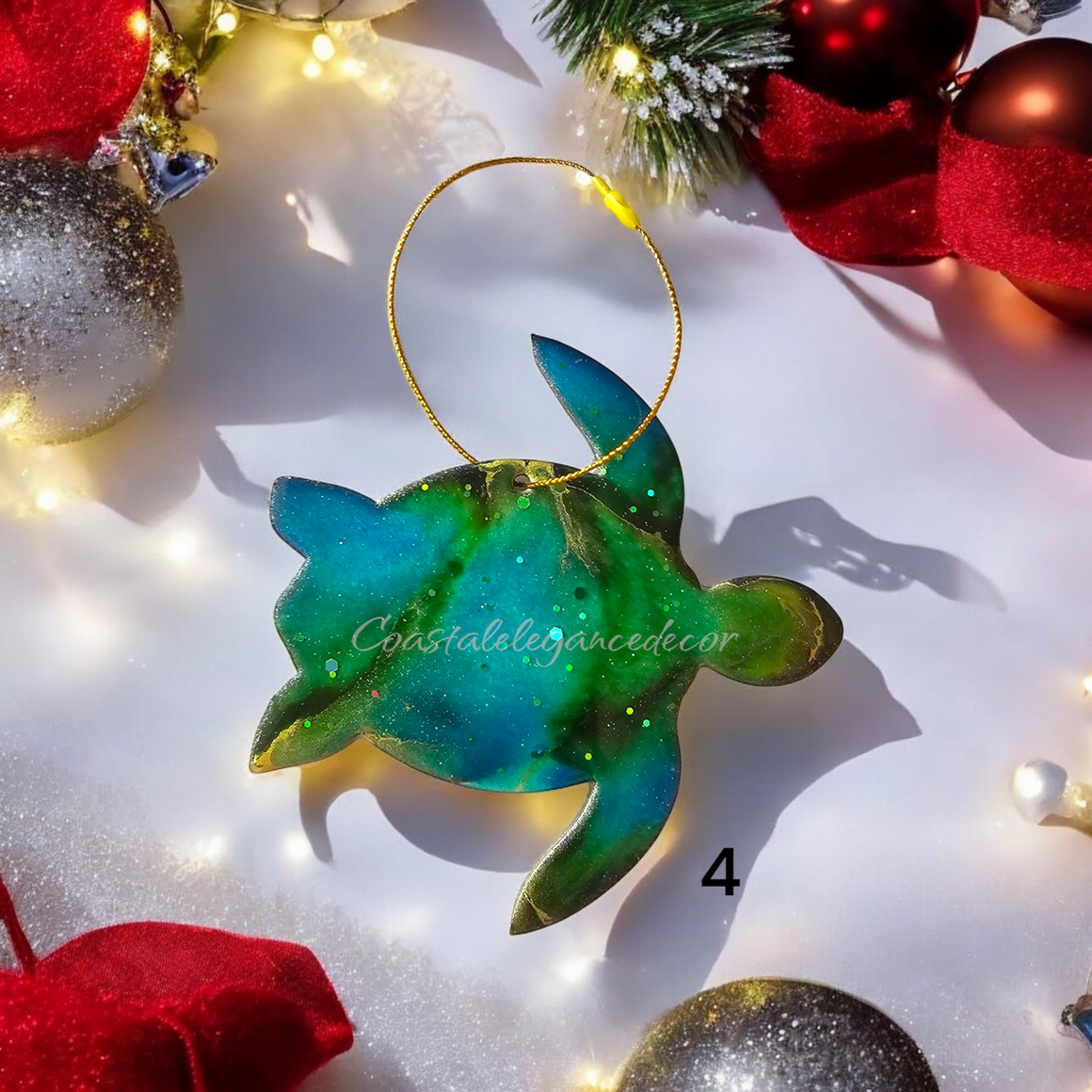 A colorful handmade resin on wood sea turtle ornament with shiny metallic accents, perfect for holiday decor.