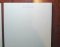 Load image into Gallery viewer, Back of white tile sawtooth hanger
