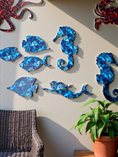 Load image into Gallery viewer, Coastal wall art collection display - fish seahorses mermaid royal marble outdoor patio
