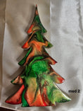 Load image into Gallery viewer, Collection of Handmade Green and Red Resin Christmas Trees with Branches Holiday Mantelpiece in various sizes for festive decor.
