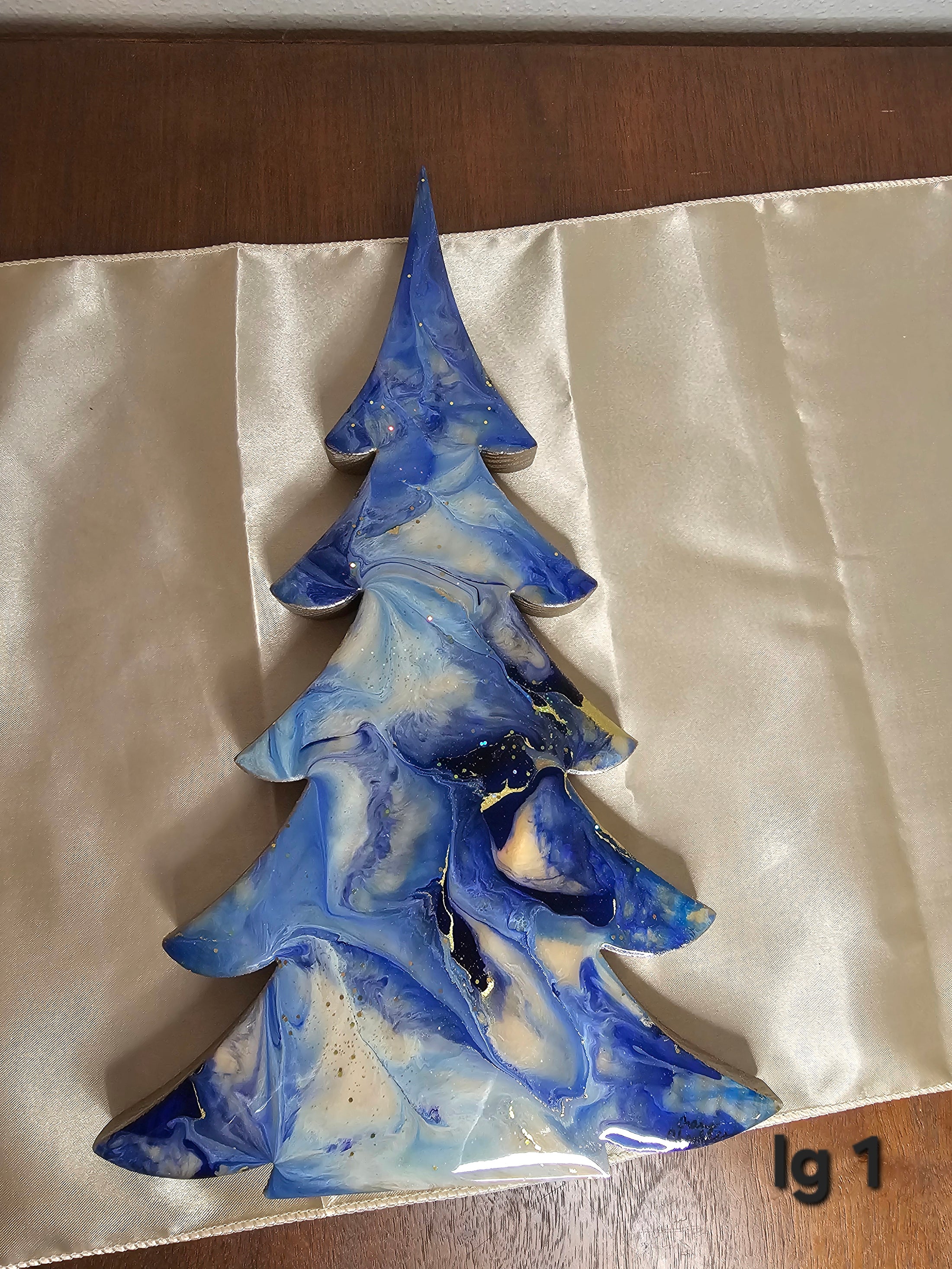 Pair of Handmade Lavender Blues and Gold Resin Wood Christmas Trees, showcasing unique patterns and swirls, perfect for adding a festive touch to your mantelpiece.