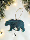 Charger l'image dans la visionneuse de la galerie, Handmade blue green resin bear Christmas ornament with white background and boughs 
