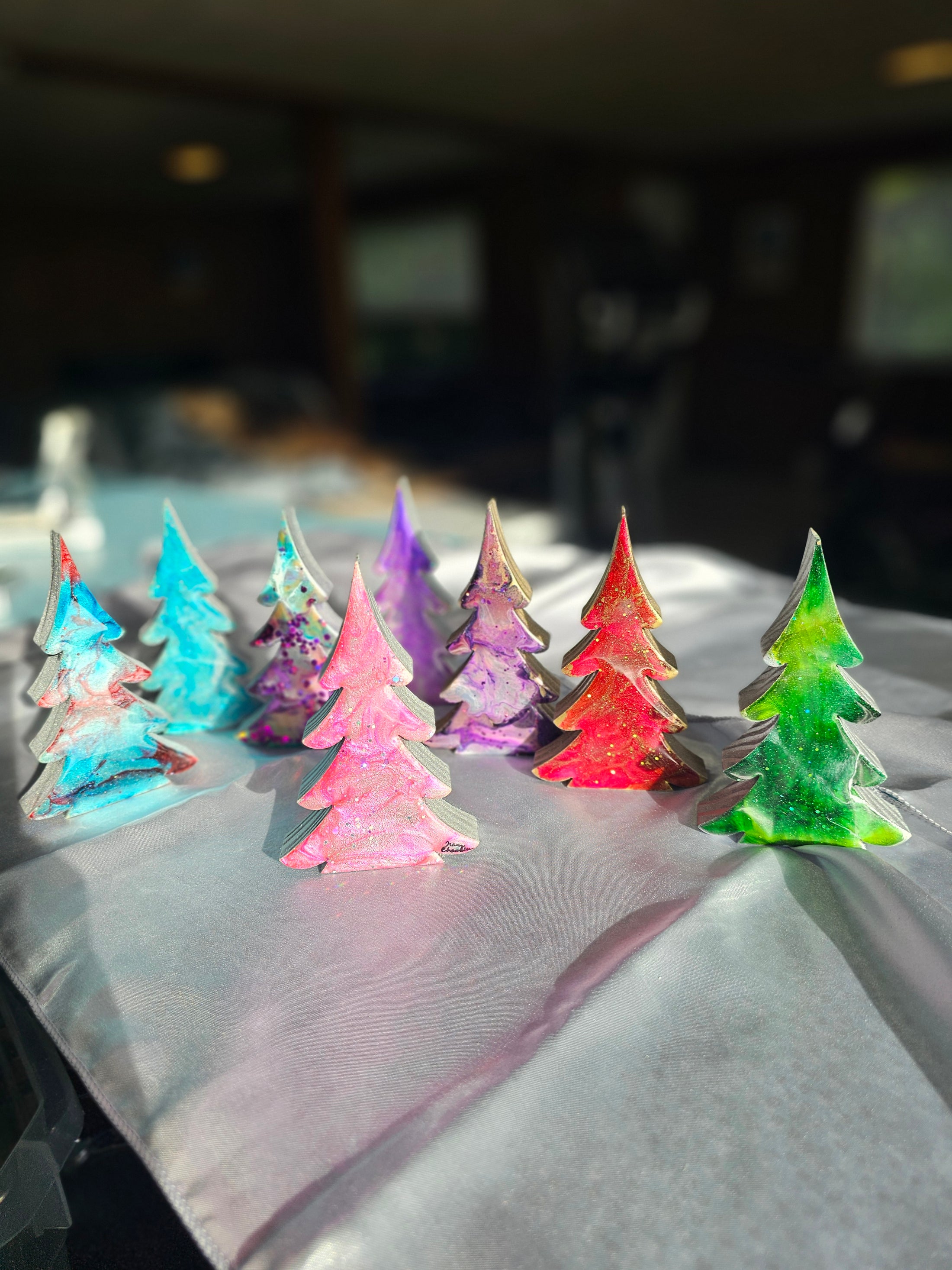 Handcrafted 5-Inch Christmas Trees with Colorful Resin and Wood for Holiday Tabletop Decor showcasing a vibrant display against a festive background.